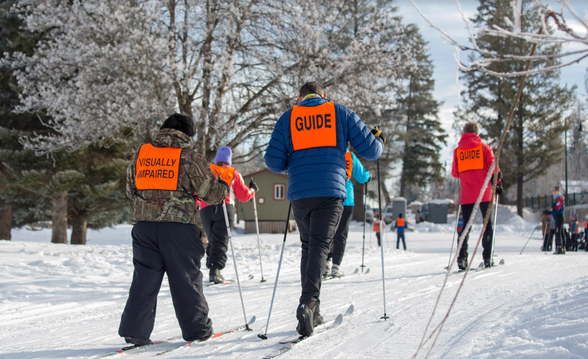 Adaptive Nordic Skier and Guide at Whitefish Lake Golf Course